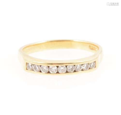 A diamond half hoop ring.