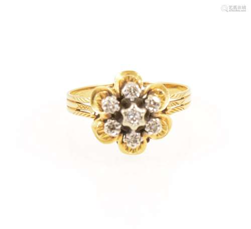 A vintage diamond cluster ring.