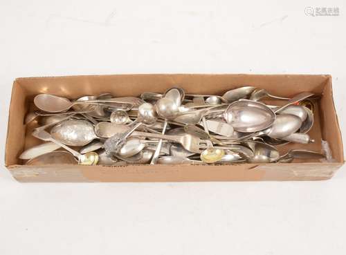 A large quantity of silver cutlery, mostly teaspoons and dessert spoons,