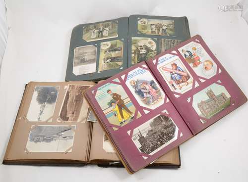 Three postcard albums and contents