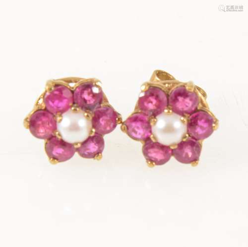 A pair of ruby and pearl cluster ear studs