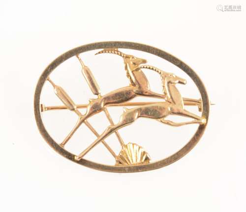 Geoffrey Bellamy for Ivan Tarratt a 9 carat yellow gold leaping gazelle brooch.