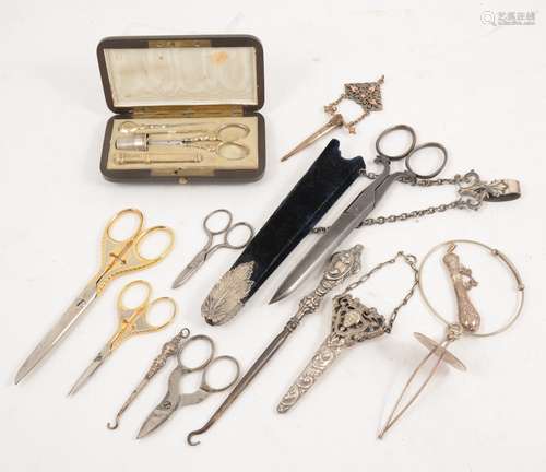 A French cased sewing set by Tahan and other sewing items.