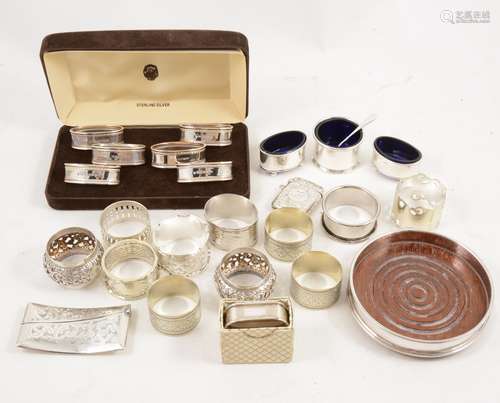 A collection of silver and plated collectables, napkin rings, vesta, salts.