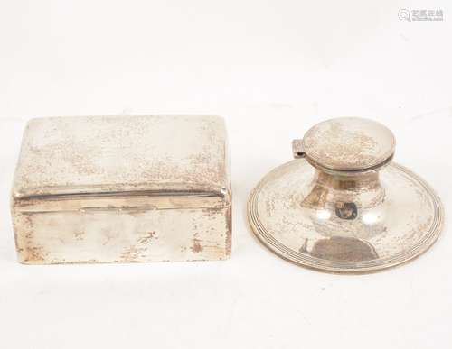 A silver cigarette/jewel box and a capstan inkwell.