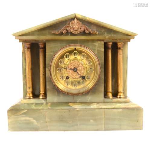 An Edwardian onyx mantel clock,