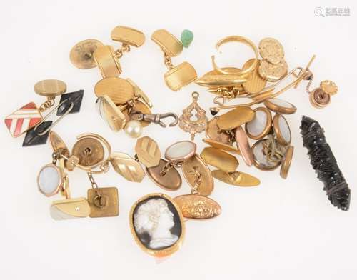 A collection of cufflinks, two brooches, cut wedding band.