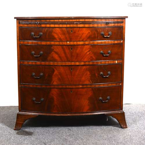 A reproduction mahogany bowfront bachelor's chest in the Georgian style