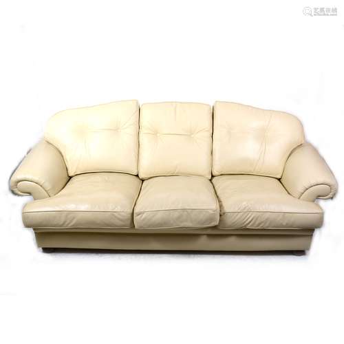 A pair of contemporary cream coloured leather three-seat sofa