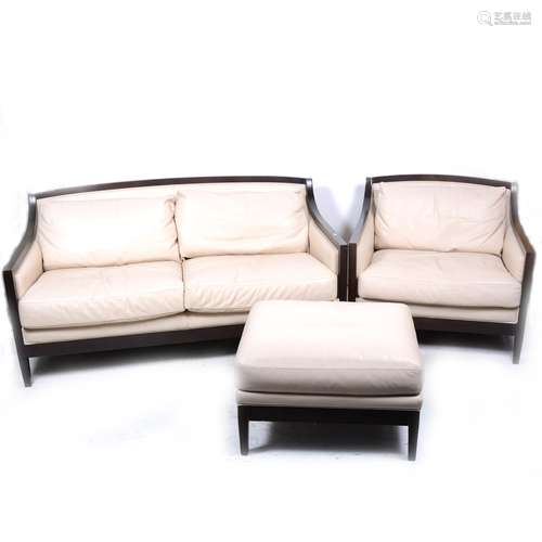 A contemporary dark stained beechwood three-piece lounge suite