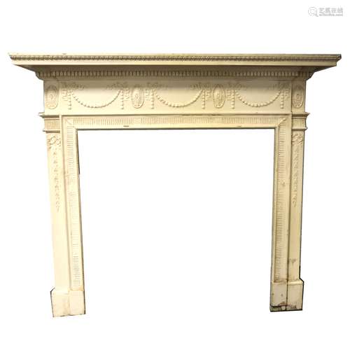 An Edwardian painted pine fire surround, in the Adam style