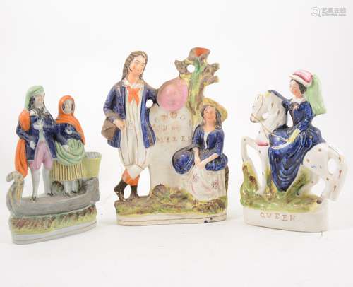 Fourteen Staffordshire figures and spill vases