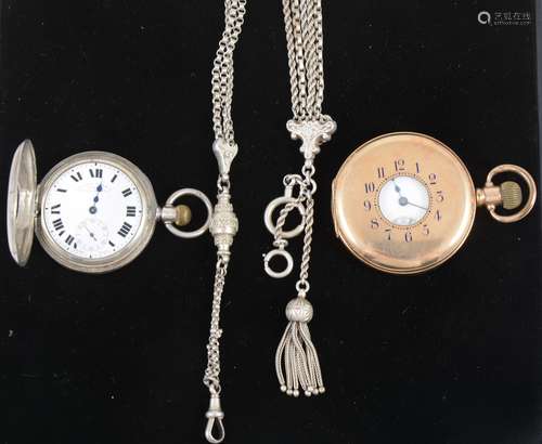 A Waltham gold plated half hunter pocket watch, a silver half hunter pocket watch and two white