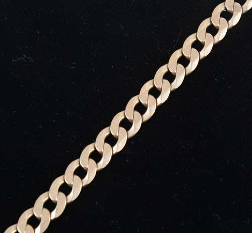 A 9 carat yellow gold flat curb link bracelet.