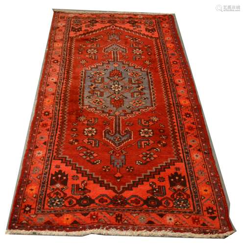 A Persian pattern rug