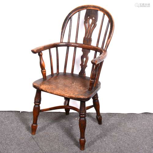 An elm Windsor style child’s chair