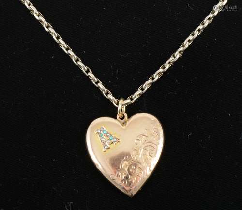 A 9 carat rose gold heart shaped locket and yellow metal chain.