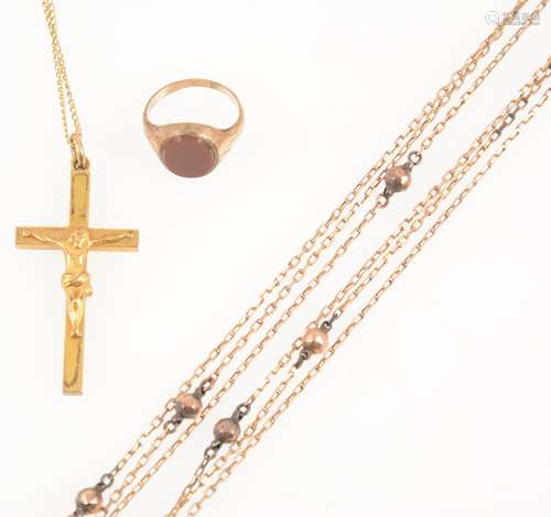 A 9 carat yellow gold signet ring and two gold-plated necklaces.