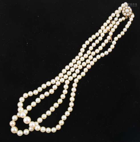 A two row cultured pearl necklace.