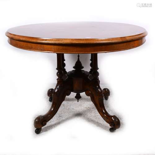 A Victorian figured walnut centre table