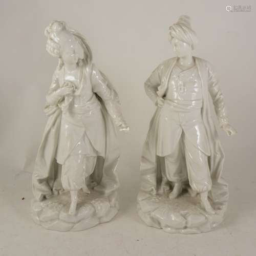 A pair of Continental porcelain figures of a courtesan and Ottoman fighter