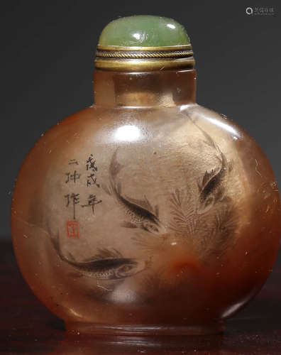 A CRYSTAL CARVED SNUFF BOTTLE