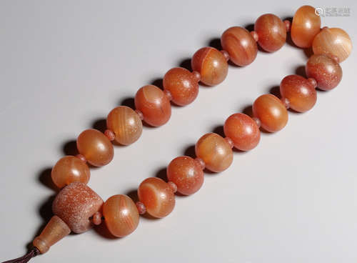 AN AGATE CARVED BRACELET