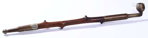 A WOOD MADE TOBACCO PIPE