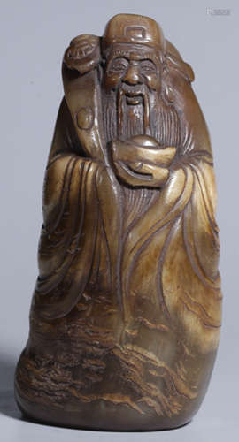 A NIUJIAO CARVED CAISHEN SHAPE SEAL