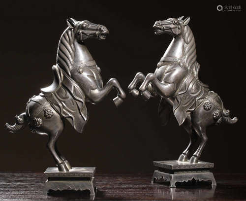 PAIR OF SILVER CAST HORSE SHAPED ORNAMENT