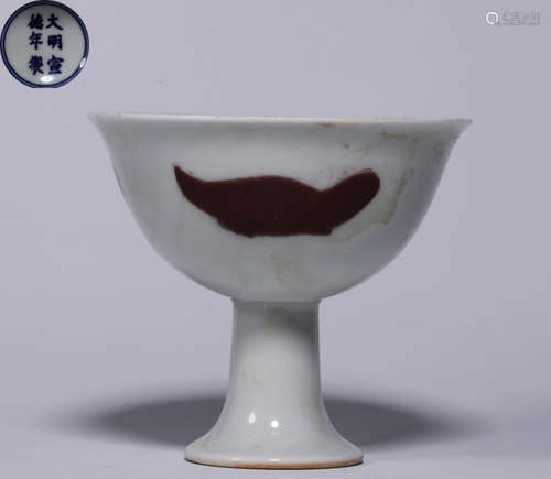 AN UNDERGLAZE RED SEAWEED PATTERN HIGH STEM CUP