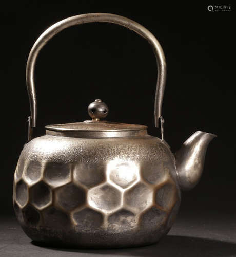 A GILT SILVER CAST POT