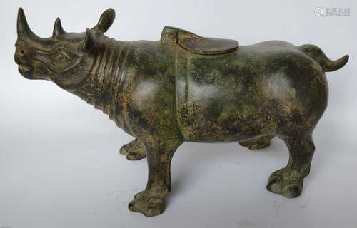 A BRONZE CAST BEAST SHAPED ORNAMENT