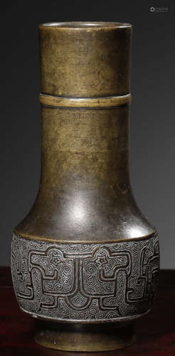 A COPPER CAST VASE