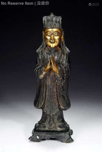 A GILT AND LACQUER BRONZE DAOIST STATUE