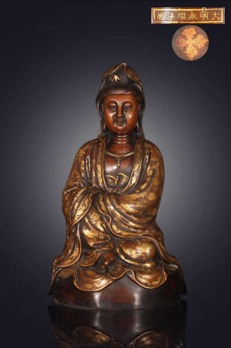 A CHINESE GILD COPPER STATUE OF GUANYIN
