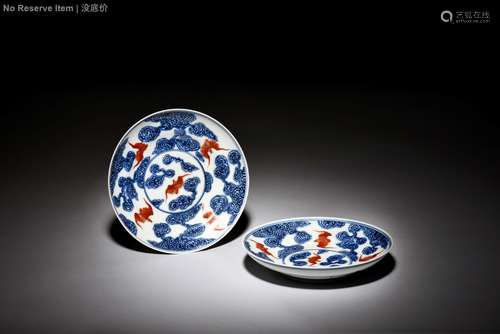 PAIR OF BLUE AND WHITE UNDERGLAZED RED 'BATS' DISHES