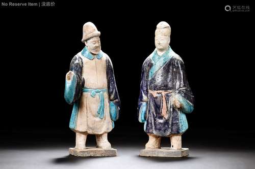 TWO CLAY AND PAINTED 'PERSON' FIGURES