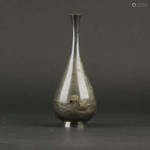 A Silver Bottle Vase