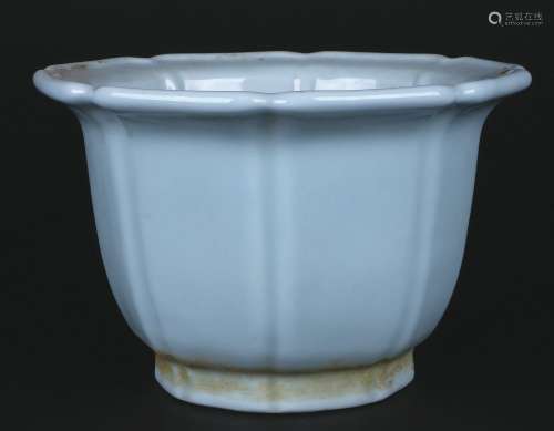 A Celadon Glazed Porcelain Octagonal Jar
