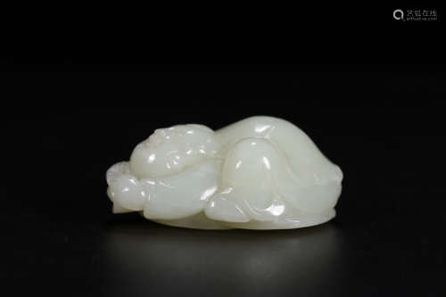 A Chinese Carved Hetian Jade Boy Ornament