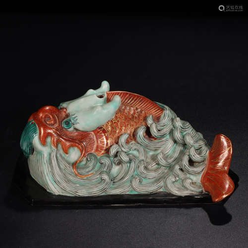 A Chinese Glazed Iron Red goldfish Converter Dragon Ornament