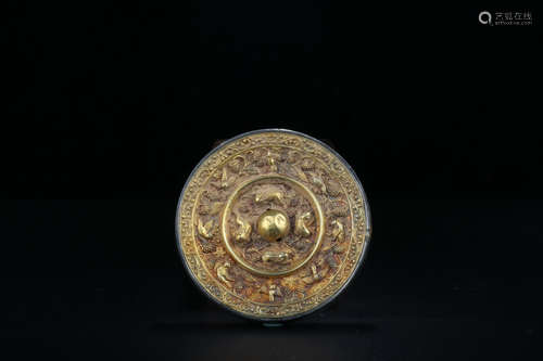 A Chinese Gild Bronze Mirror