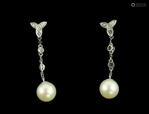 An Edwardian pair of diamond and pearl drop earrings, set with rose and old cut diamonds,