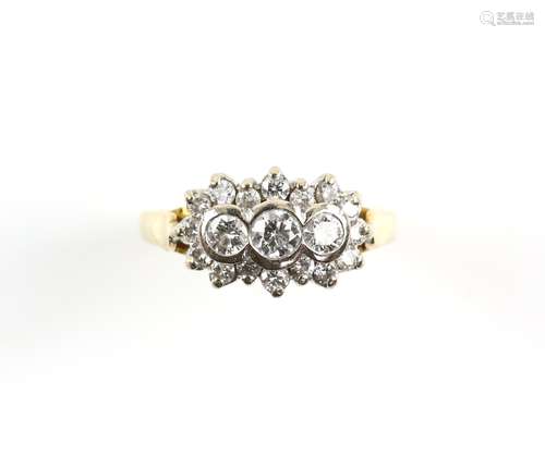 Modern diamond cluster ring, set with nineteen round brilliant cut diamonds, estimated total diamond