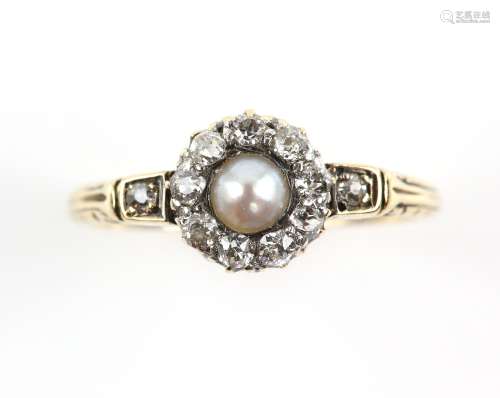 Victorian dress ring, central grey pearl, 4mm in diameter, surrounded by old cut diamonds, mount