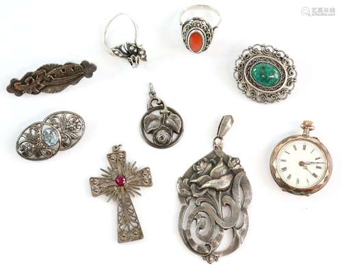 Mixed group of items, including an antique silver and gold brooch, blue topaz brooch, rose pendants,