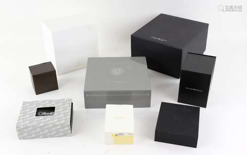 A group of empty boxes, including Omega outer box and instruction booklets, Maurice Lacroix, Two