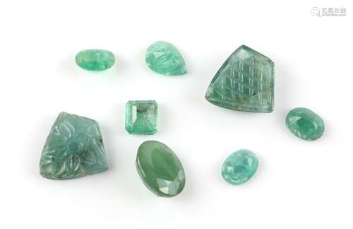 Mixed group of loose emeralds, two carved emerald pieces, floral motif, approximately 15 x 9mm each,