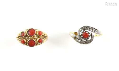 Two coral rings, one twist ring set with round cabochon cut coral and rose cut diamonds, ring size N